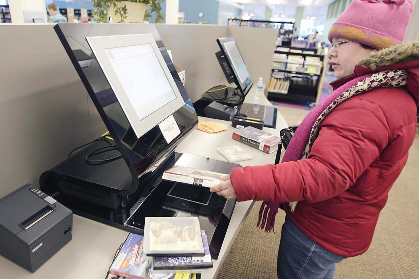 Patsy Garland Library adds self-checkout systems - InForum | Fargo, Moorhead and West ...