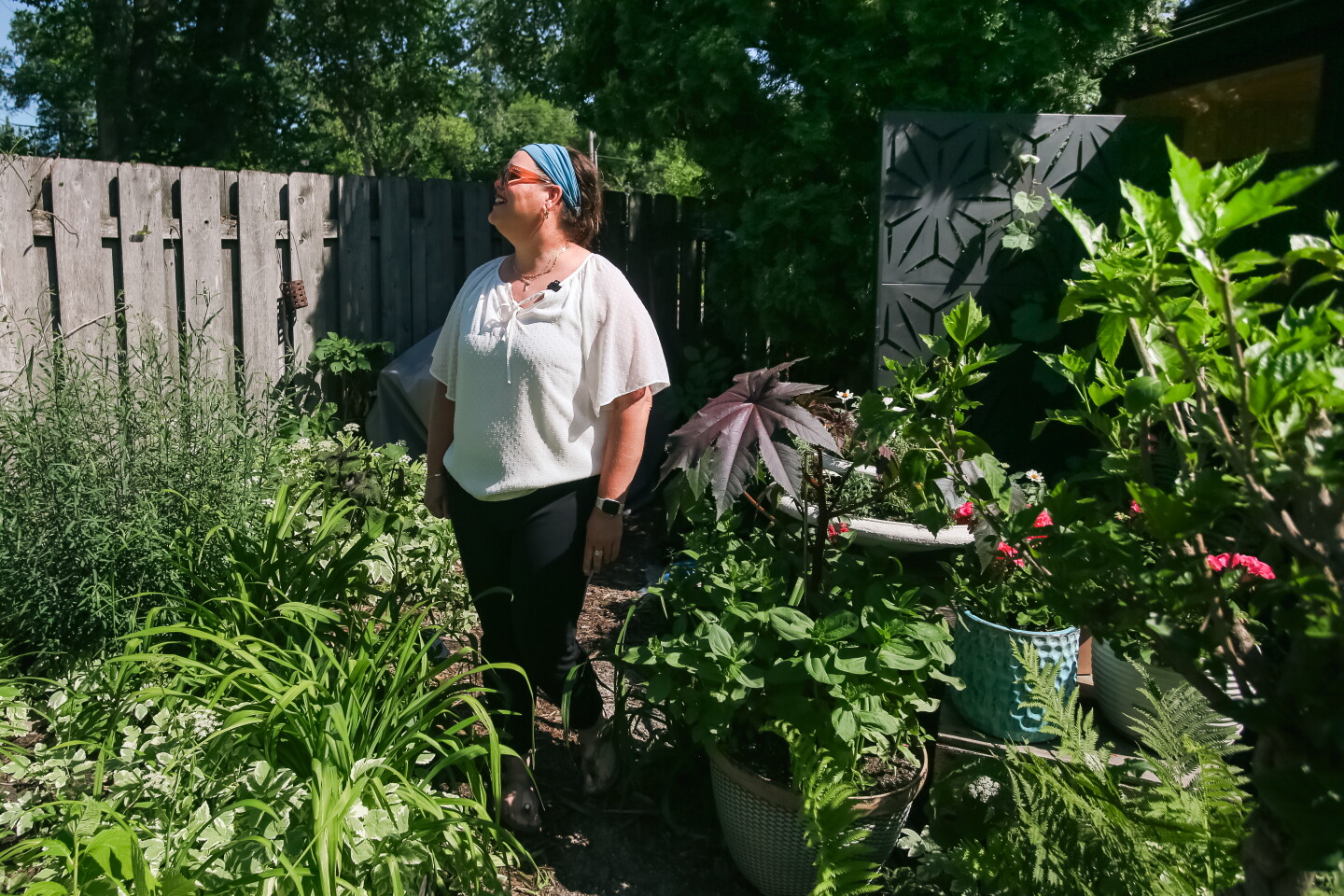 Alyssa Miller is in her backyard garden on July 2, 2025, in south Fargo.
