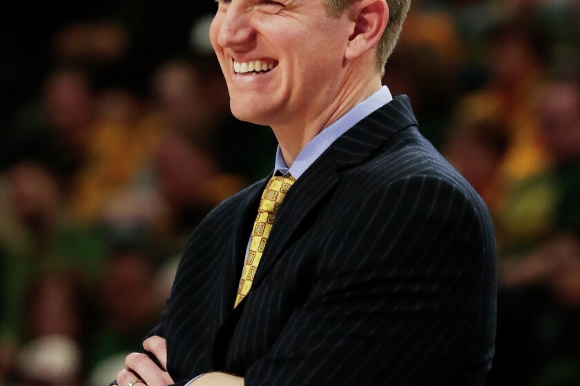 His true starting five: Bison coach balances leading program with busy ...