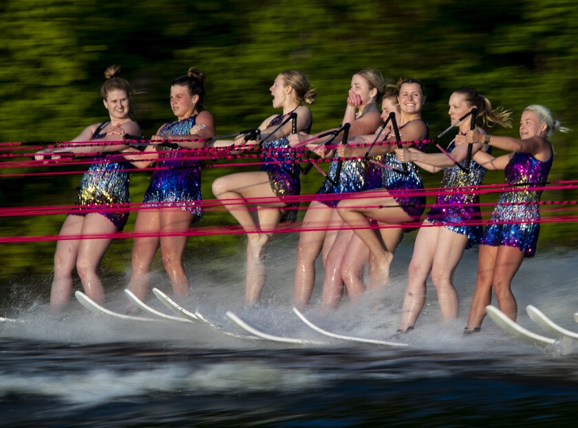 Skiers zoom along the waters while performing at Neer Park in New London during the opening performance of the summer season on Friday, June 3, 2022.