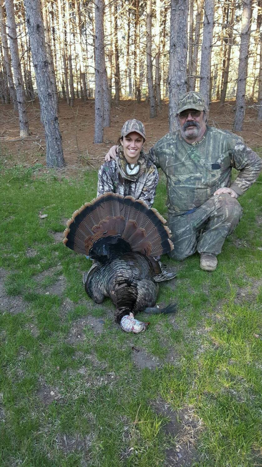 Ralph Warzecha (right) with his daughter-in-law Ashley Current and her turkey. Submitted photo