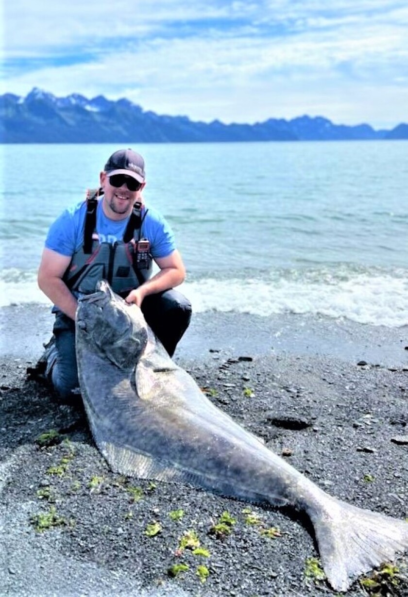 David Rokser and his 63-inch halibut