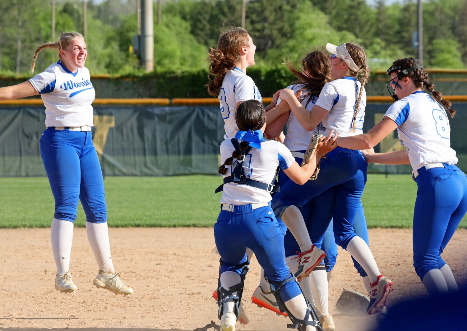 Brainerd softball team celebrating their win.