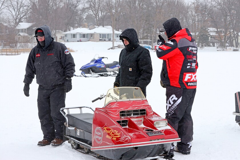 Scorpion snowmobiles and their owners gather on Serpent Lake during the 18th annual Cuyuna Lakes Ice Fishing Contest and Scorpion Homecoming.