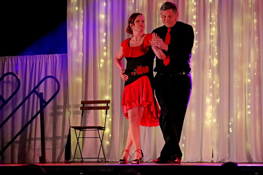 Dancer perform on stage.