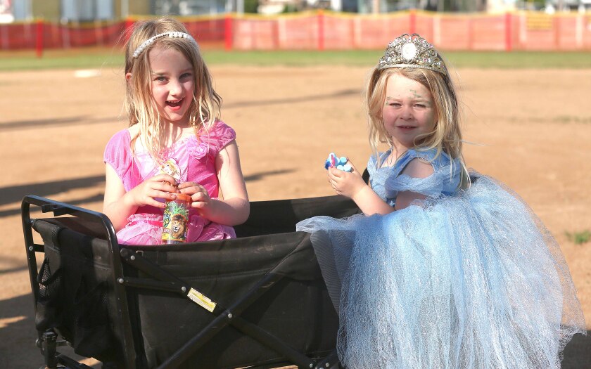 Two girls dressed as princesses