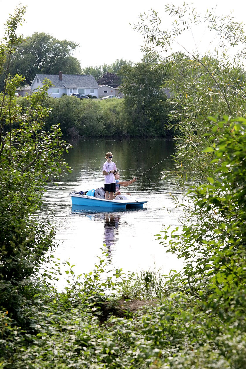 Dylan Johnson, left, and Ryland Doolittle both cast into Superior Bay