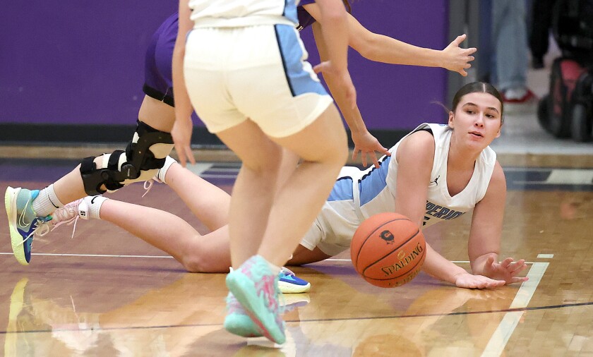 Player tips ball.