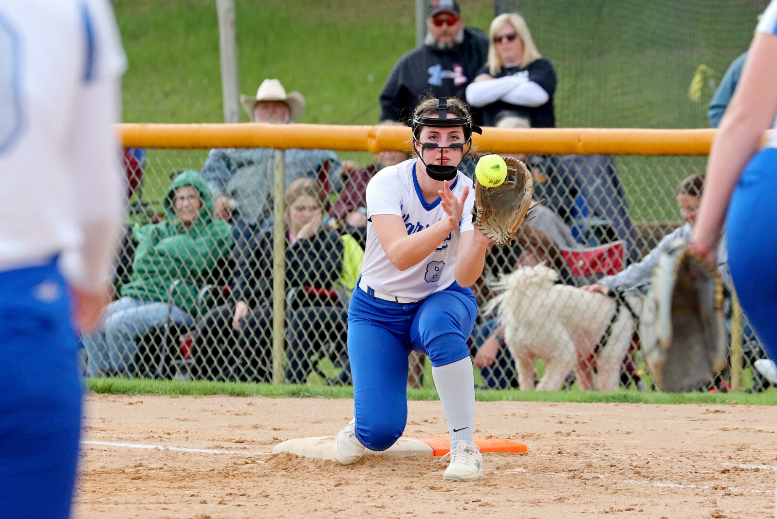 Brainerd's Emma Tautges makes an out at first against Forest Lake.