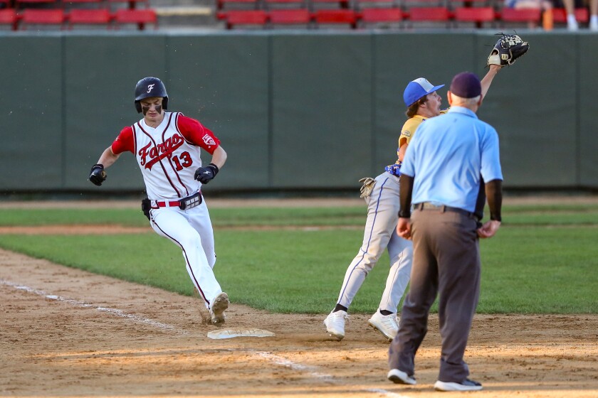 Fargo Post 2's Caden Nelson beats out a throw to first base for a single against Thief River Falls Post 117 on Friday, June 27, 2025, at Jack Williams Stadium in north Fargo.