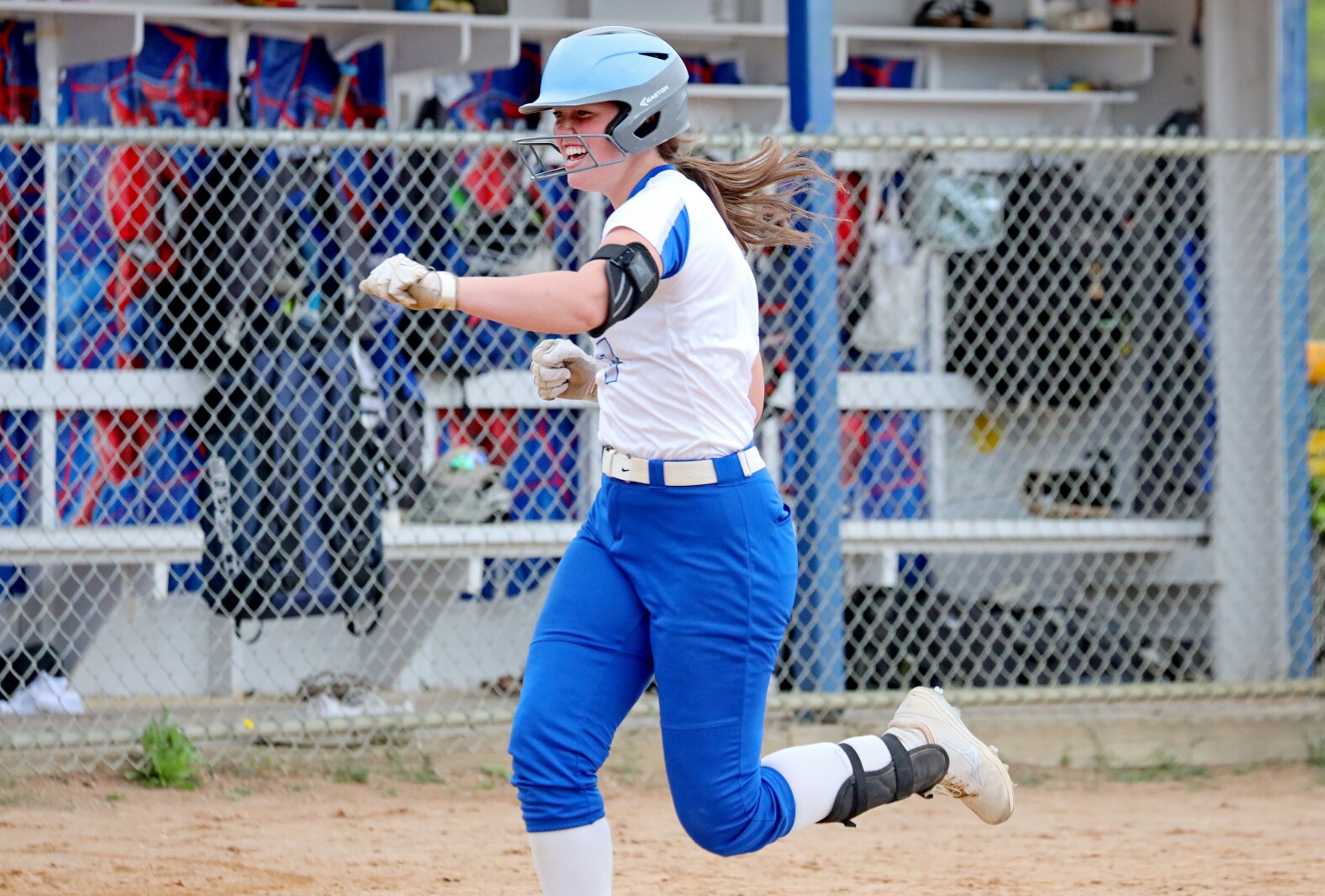Brainerd's Olivia Tautges celebrates a home run against Forest Lake as she runs the bases Friday, May 20, 2022, in Brainerd.