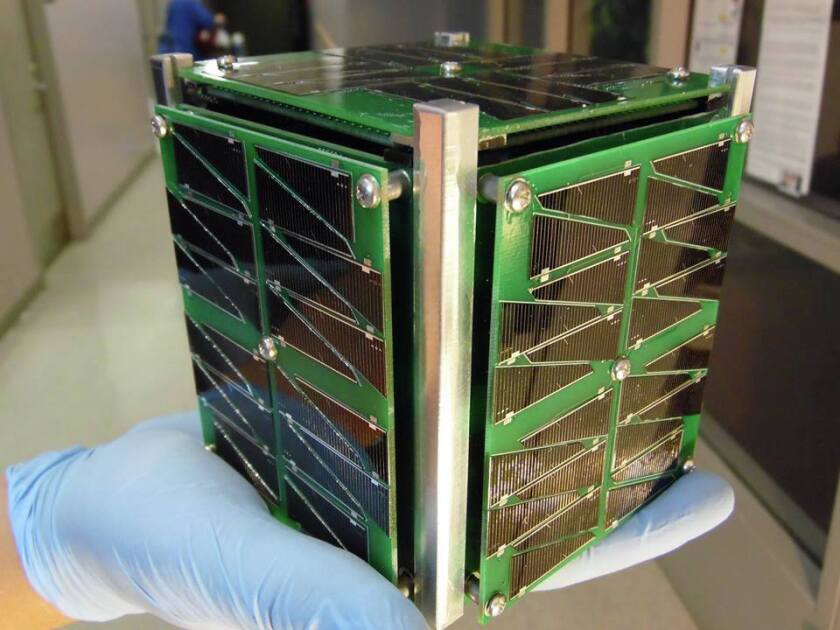 Students from North Dakota State University and the University of North Dakota meet to discuss the construction of OpenOrbiter 1, the first satellite to be built in North Dakota. Jeremy Straub / NDSU)