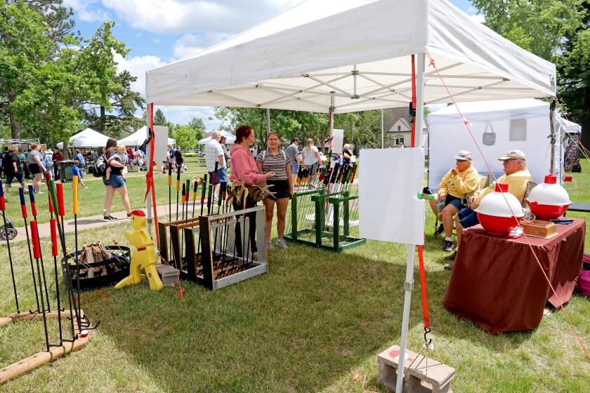 People attend Arts in the Park on Sunday, June 26, 2022, at Gregory Park in Brainerd.