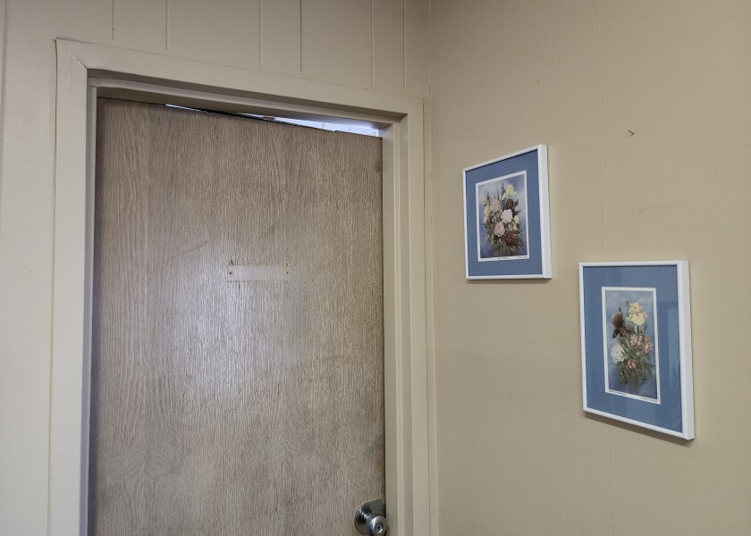Due to floors subsiding, some of the non-load-bearing walls in West Learning Center have settled, leaving oddly-shaped doorways like this one, photographed on July 21, 2022.