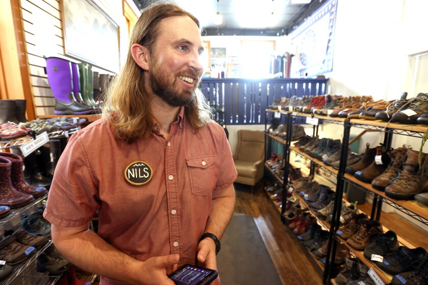 Man standing in a store.