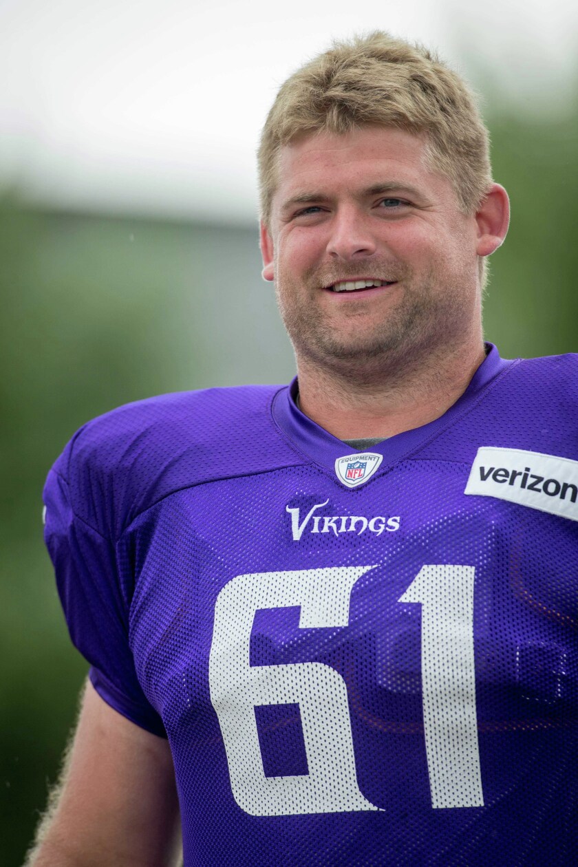 Aug 1, 2016; Mankato, MN, USA; Minnesota Vikings center Joe Berger (61) walks to the afternoon session of training camp at Minnesota State University. Mandatory Credit: Bruce Kluckhohn-USA TODAY Sports