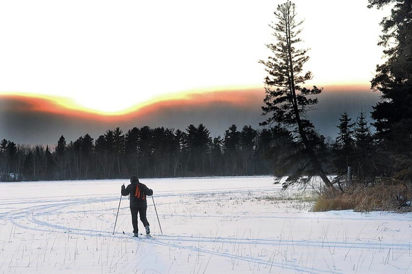 49706+0221-sunset-skier.jpg