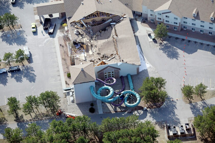 Damage can be seen at the Thumper Pond Lodge Wednesday, April 15, 2015, in Ottertail, Minn, after the roof over the waterpark collapsed around midnight.Dave Wallis / The Forum
