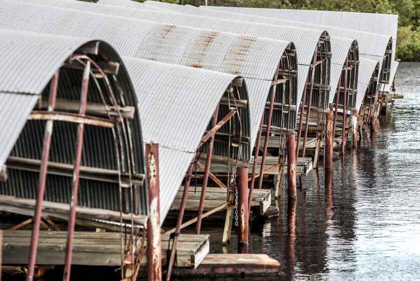 A dilapidated marina in Tower has a new owner with plans to rehab the space -- clearing the way for more long-planned developments in Tower's harbor, such as a town home complex and new affordable housing. (Clint Austin / Forum News Service)