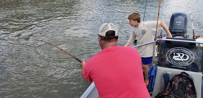 070321.O.GFH.REDCATS-Photo 3 Braden netting fish.jpg