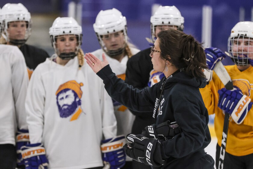 girls hockey players during practice