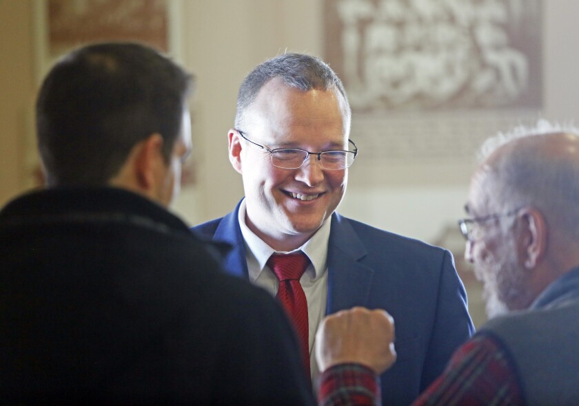 Mac Schneider visits supporters after announcing his intention to run as the Democratic candidate for the United States House of Representatives on Tuesday, March 6, 2018, at the Depot in downtown Fargo. David Samson/The Forum