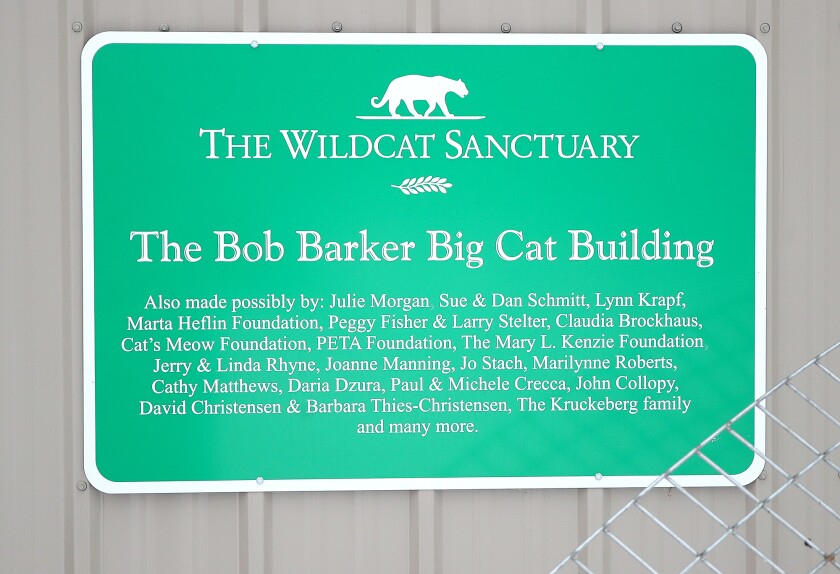 A sign honoring former Price is Right host Bob Barker hangs on a building at The Wildcat Sanctuary