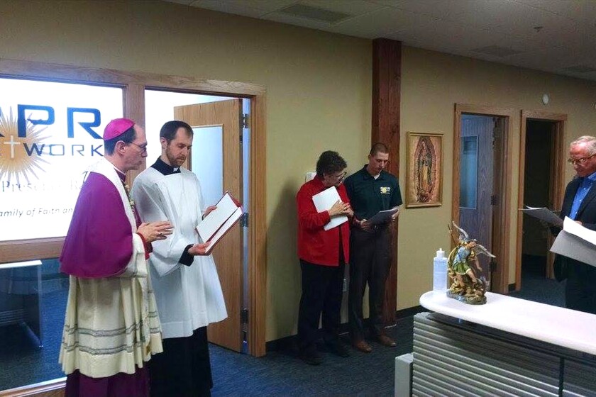 RPR_Bishop John Folda blessing second Fargo office in Meadowlark building downtown Fargo, 2016.jpg