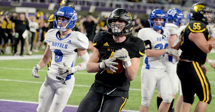 NLS junior Lucas Swenson crosses the goal line for a 1-yard touchdown run during the Class AAA state semifinals against Watertown-Mayer on Saturday, Nov. 19, 2022 at U.S. Bank Stadium in Minneapolis.