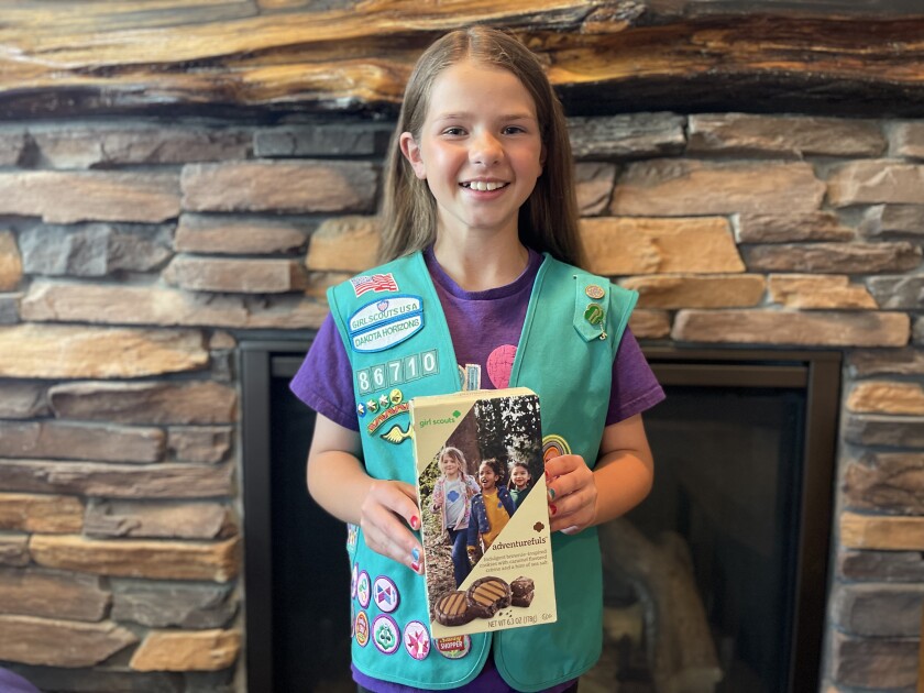 Girl Scout Ellisyn Ahmann, of Dickinson, is the top seller of cookies for both North and South Dakota. 