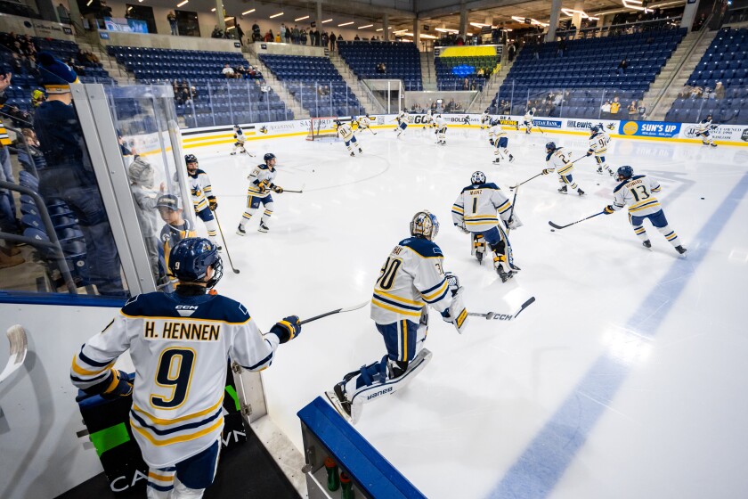 Augustana players take the ice for pre-game warmups prior to the start of a game against Omaha on Friday, Dec. 19, 2025, at Midco Arena in Sioux Falls.