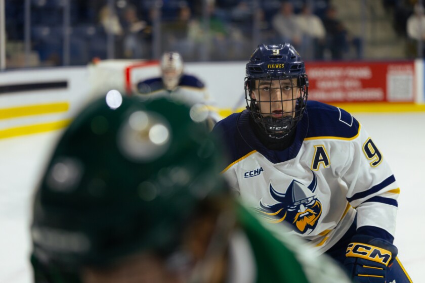 Augustana's Hayden Hennen closes in on a Bemidji State player Friday, Dec. 5, 2025, at Midco Arena in Sioux Falls.