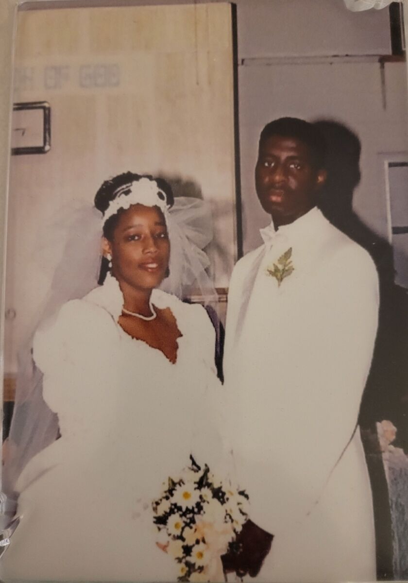 Pastor Henry Jenkins_Michelle and Henry on wedding day, April 11, 1992.jpg