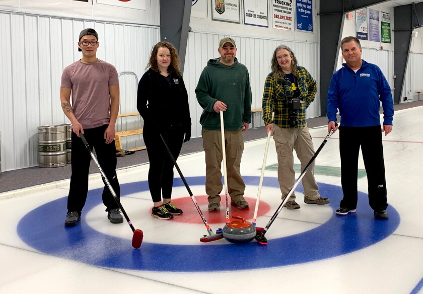 Group shot of curling group.