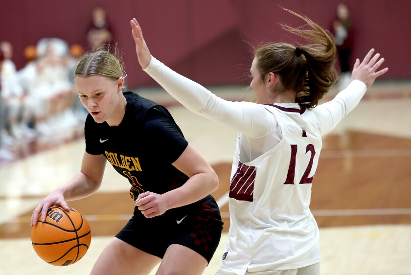 Player dribbles ball.