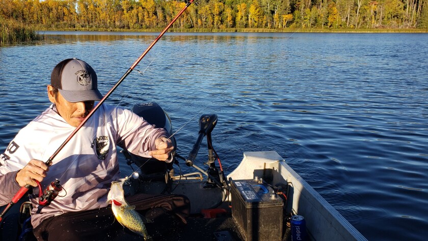 Daris swinging a crappie.jpg