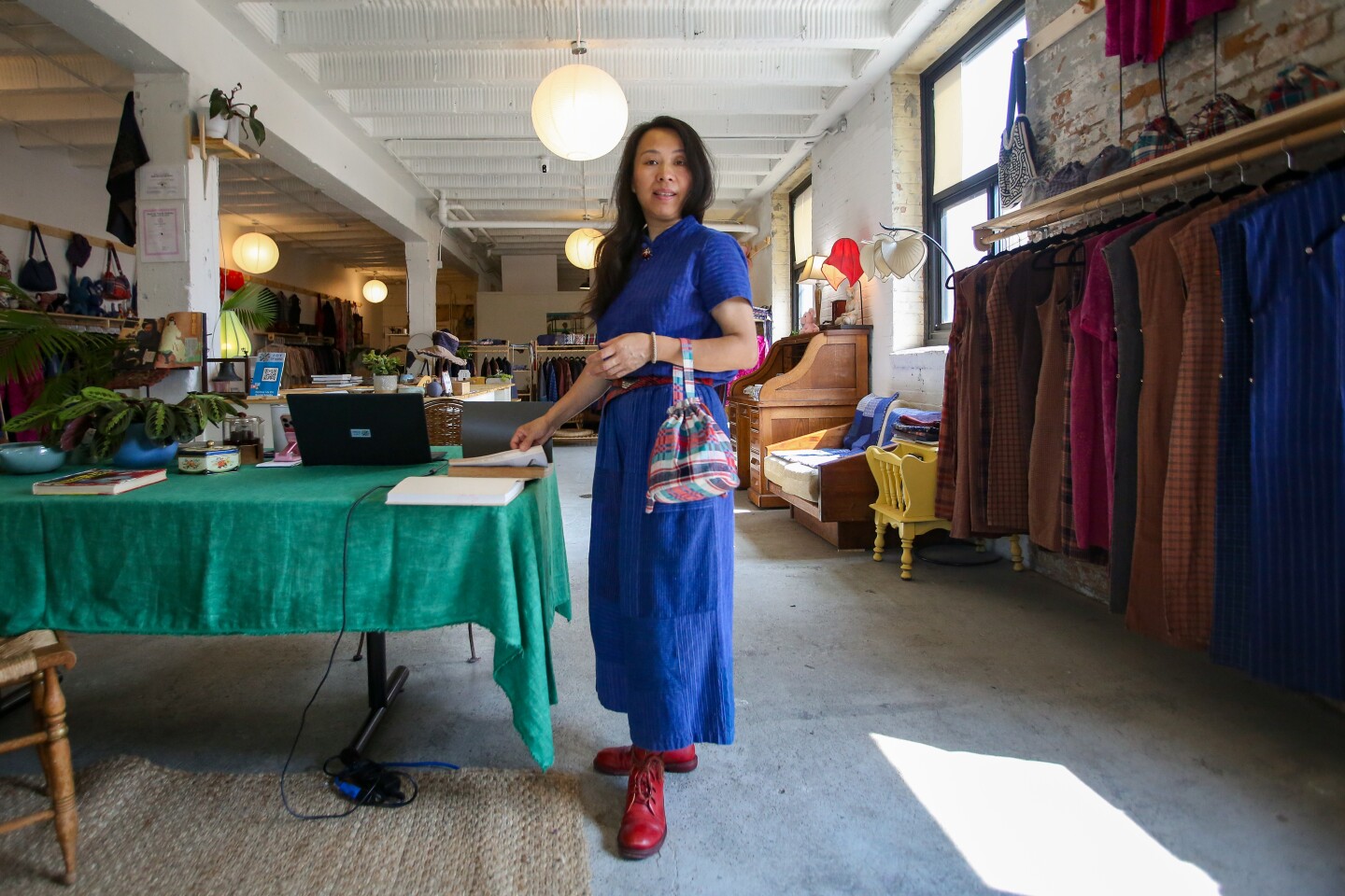 Aying Zhang in her shop, JOY STUDIO, at 910 Main Avenue in downtown Fargo on July 24, 2025.