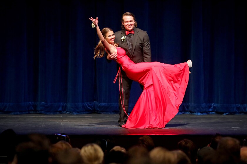 Hunter Wendt dips Paige Lee mid-stage during grand march.
