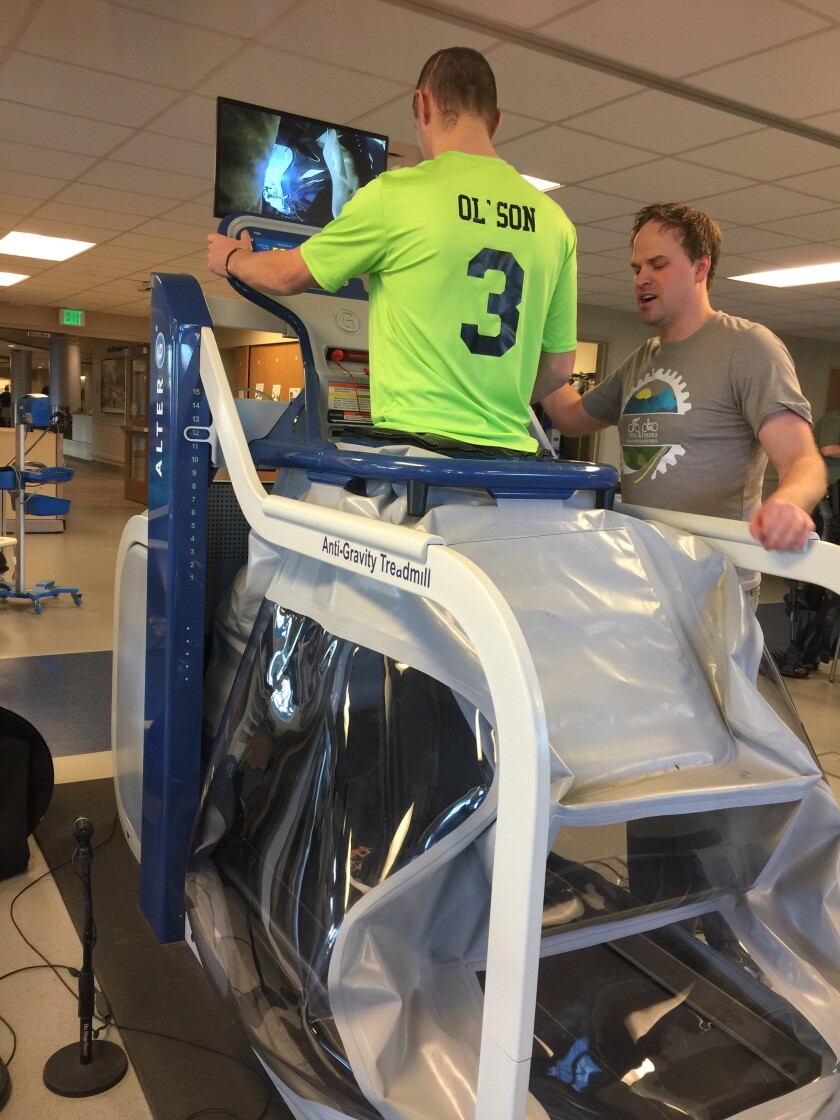 Jayden Olson does rehabilitation on an anti-gravity treadmill in Craig Hospital. (Submitted photo)