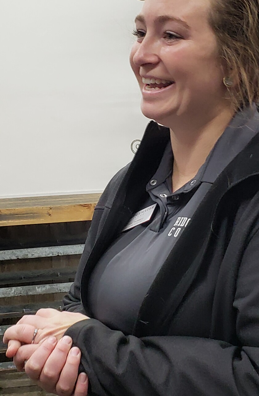 A woman smiling