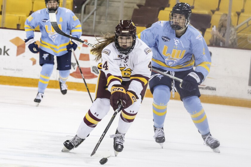 college women play hockey