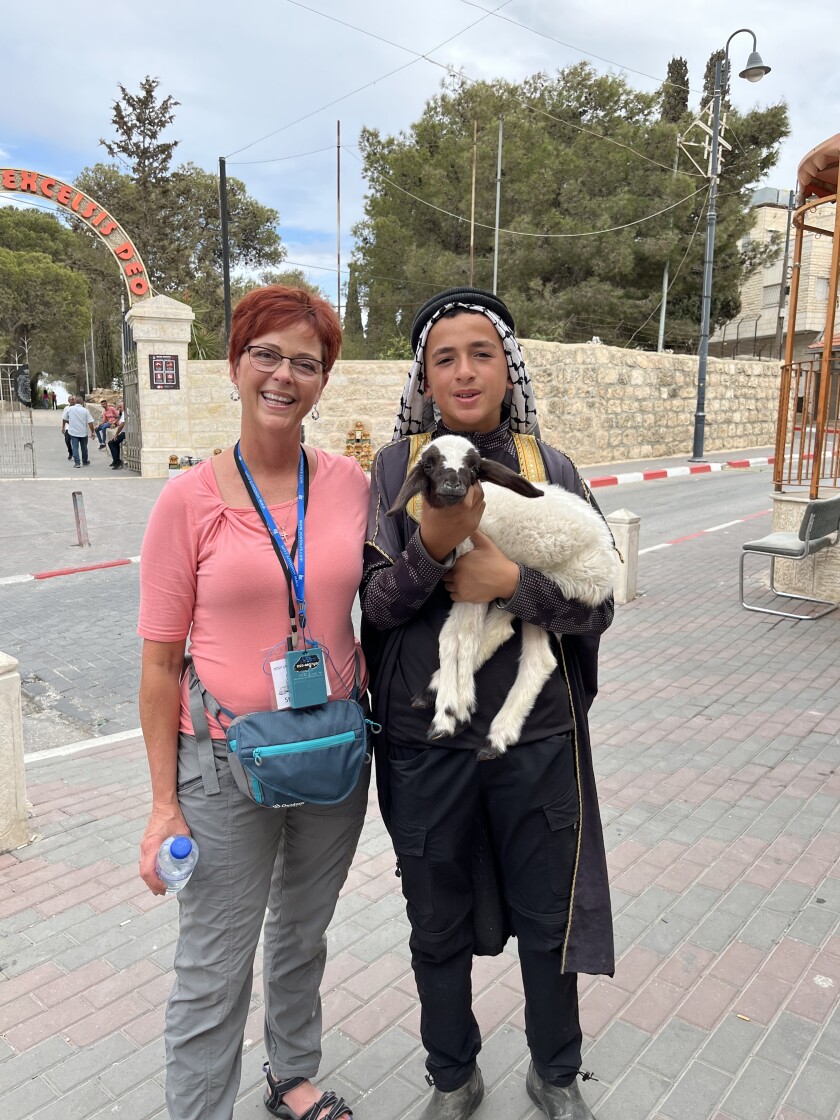 Holy Land Stacy Schwab and Shepherd with Sheep near Church of the Good Shepherd Jericho, home to 200 Arab Christians, Oct. 7.jpeg