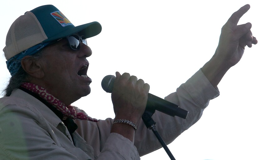 Keith Secola sings to the crowd at the Water is Life Festival