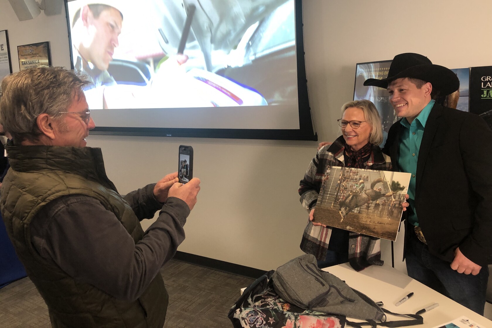 Granite Falls local celebrity Tanner Aus steps from the arena onto the ...