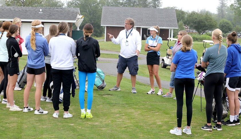 Superior head golf coach Ed Willie, center, talks to his team before their meet at Nemadji Golf Course