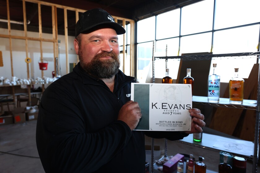 Man holds drink label