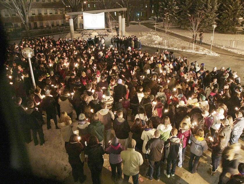 Students light candles