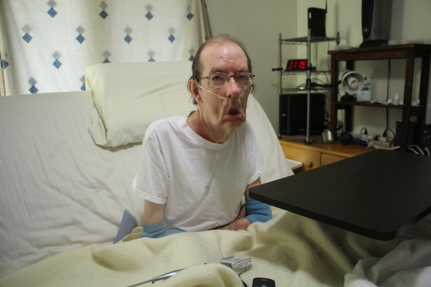 Lamplighter resident David Karkinen has advanced muscular dystrophy and worries about losing medical and personal care help he receives through Medicaid. Meagan Pittelko/Tribune