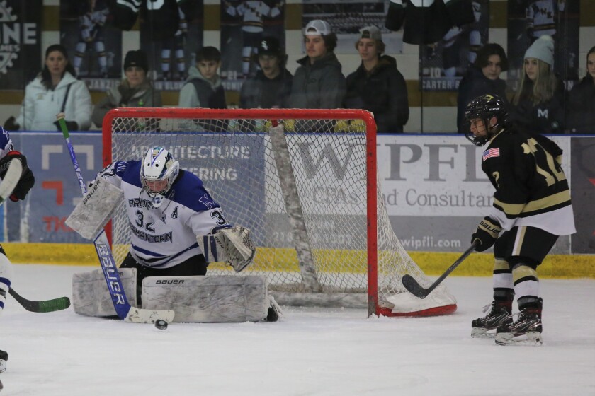 Proctor/Hermantown's Abby Pajari makes a save.