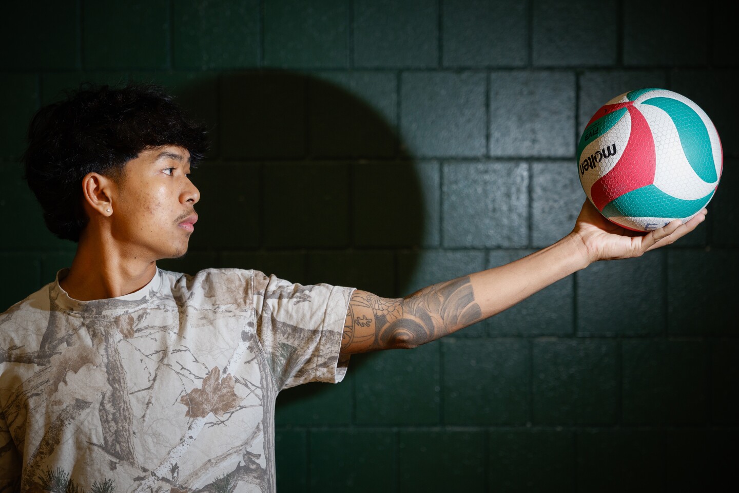 Cambodia native Reatrey Rith finds volleyball home with Rochester boys ...